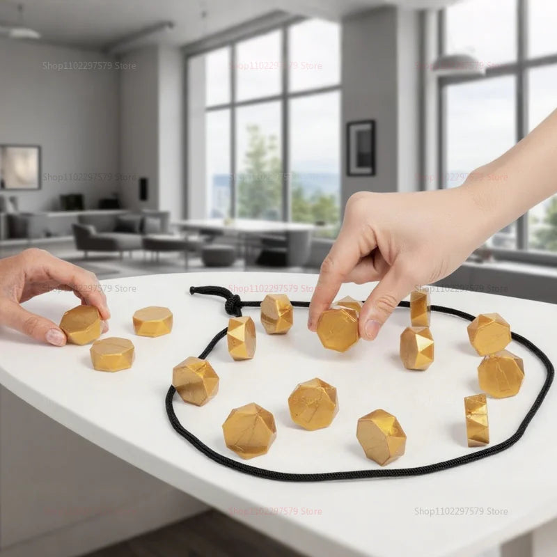 Magnetic tension puzzle stones and rope arena on a table