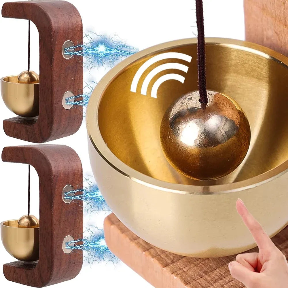 Wood body with copper bell — close-up