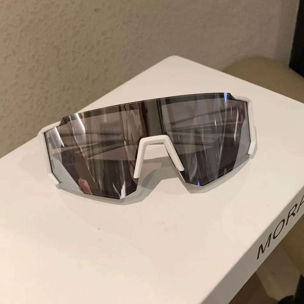 Lens curvature — wind/sand protection